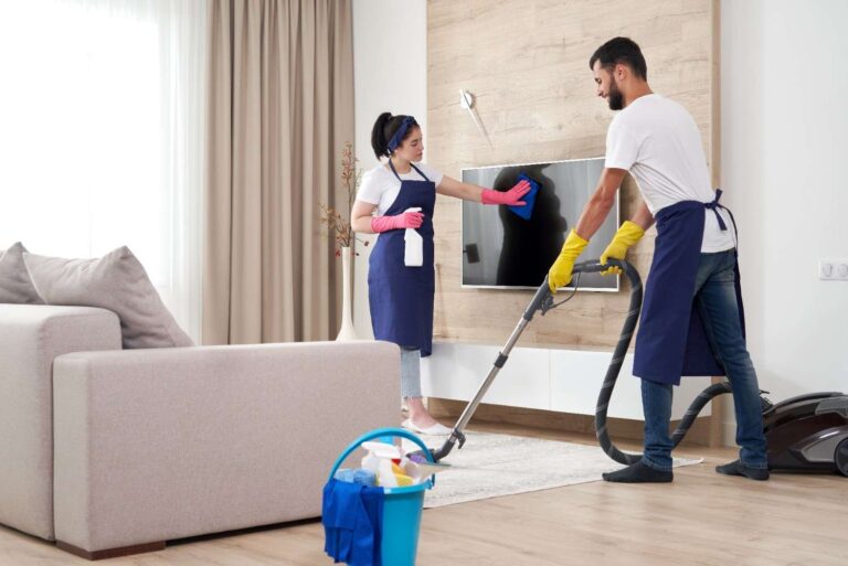 professional-cleaning-service-team-cleans-living-room-modern-apartment (1)